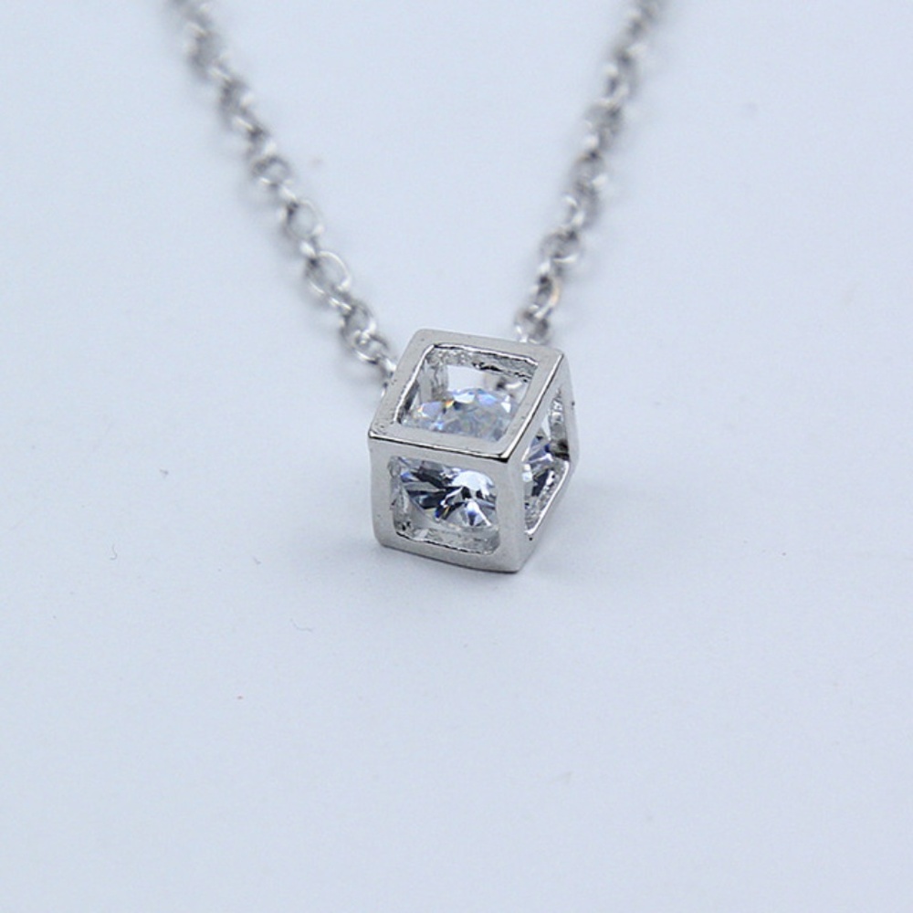 Crystal necklace locked inside silver box